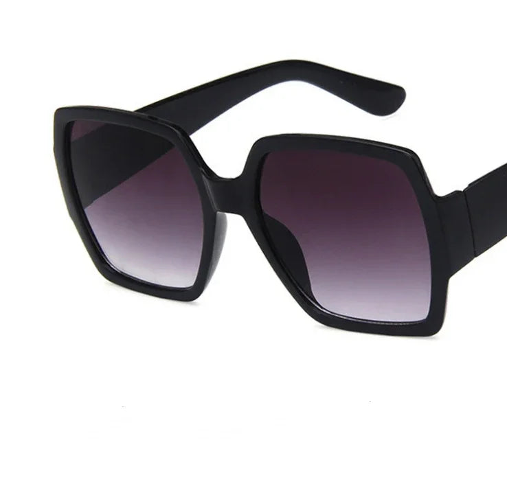 Square oversized black sunglasses with gradient lenses, modern streetwear style