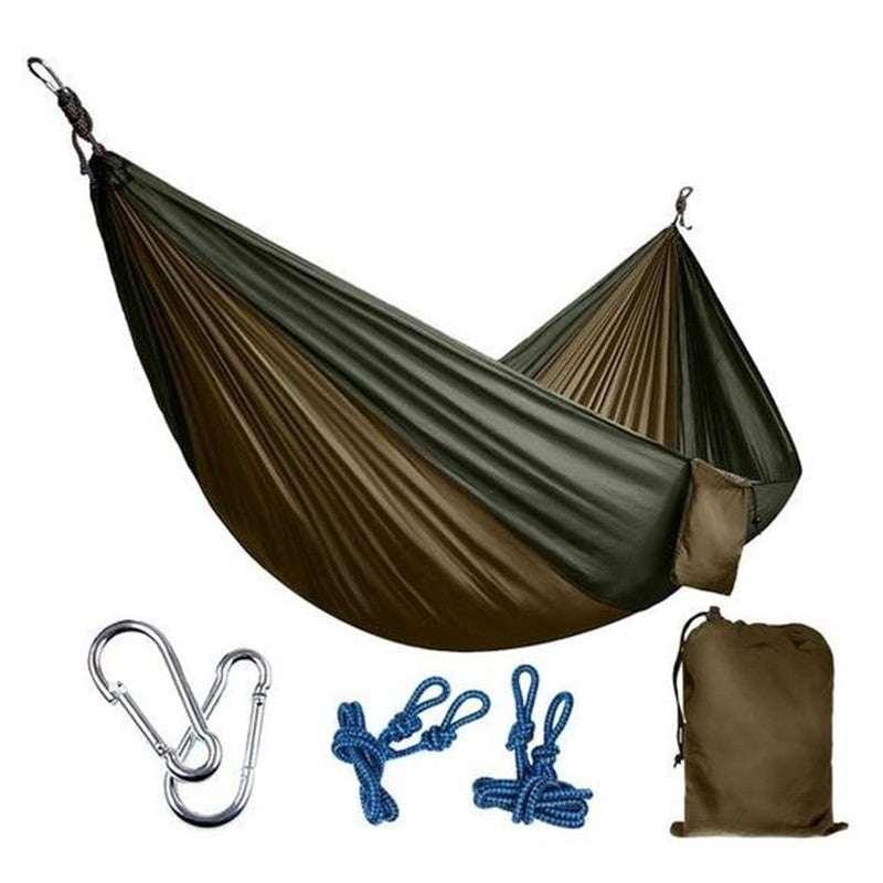Olive green and brown nylon camping hammock with ropes, carabiners, and carry bag