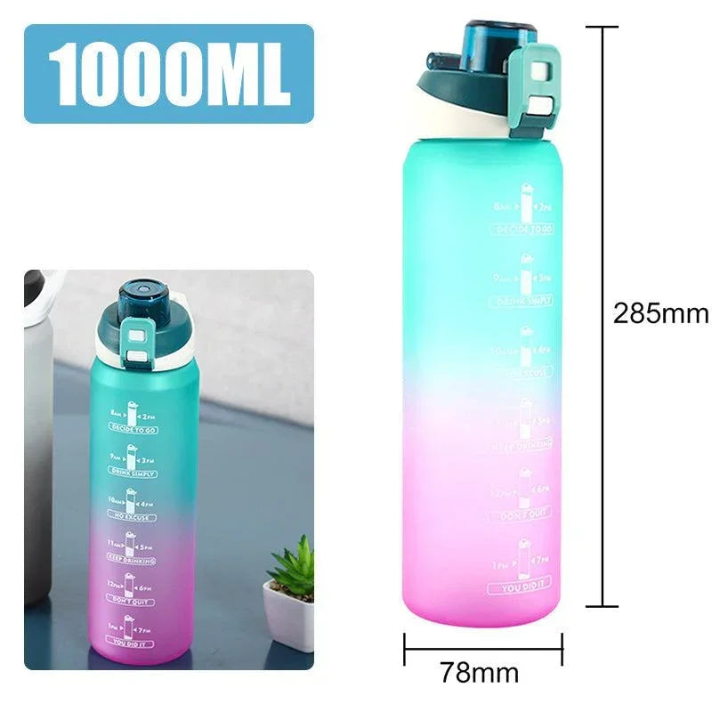 Gradient teal and pink water bottle, 1000ml, plastic, flip top, marked measurements, tall slim fit.
