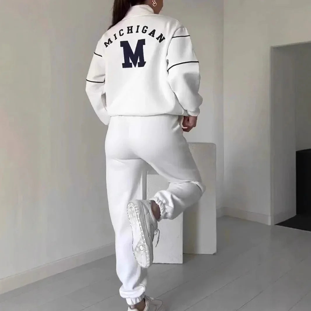 White relaxed-fit sweatshirt and jogger set with sporty Michigan lettering and elastic cuffs