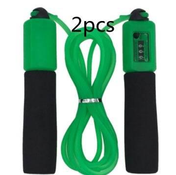 Green jump rope with black foam handles and digital counter, two-piece set.