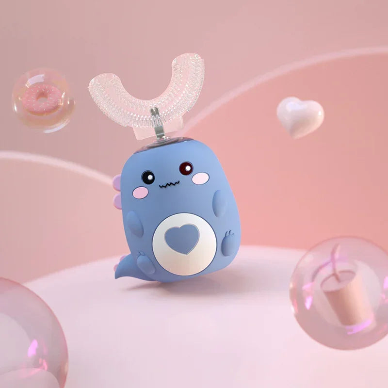Cute blue dinosaur-shaped silicone kids toothbrush with U-shaped brush head on pink background