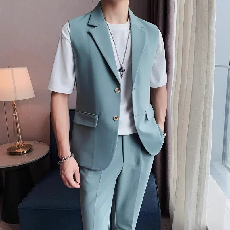 Man wearing light blue sleeveless suit with white crewneck t-shirt, modern slim fit style