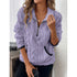 Woman wearing a lilac sherpa fleece pullover with half-zip and relaxed fit