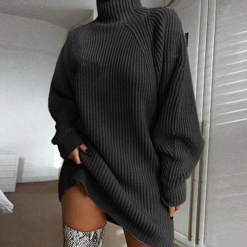 Oversized black ribbed turtleneck sweater dress with long sleeves and relaxed fit