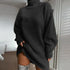 Oversized black ribbed turtleneck sweater dress with long sleeves and relaxed fit