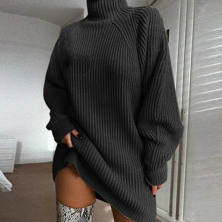 Oversized black ribbed turtleneck sweater dress with long sleeves and relaxed fit