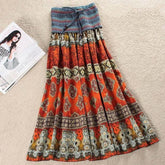 Bohemian maxi skirt with orange, blue, and yellow ethnic print, loose fit, lightweight fabric