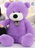Large purple plush teddy bear with a checkered bow tie, soft fuzzy material, oversized fit