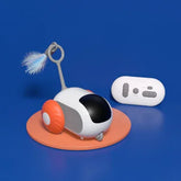 Futuristic white and orange remote control cat toy with feather teaser, plastic material, modern design