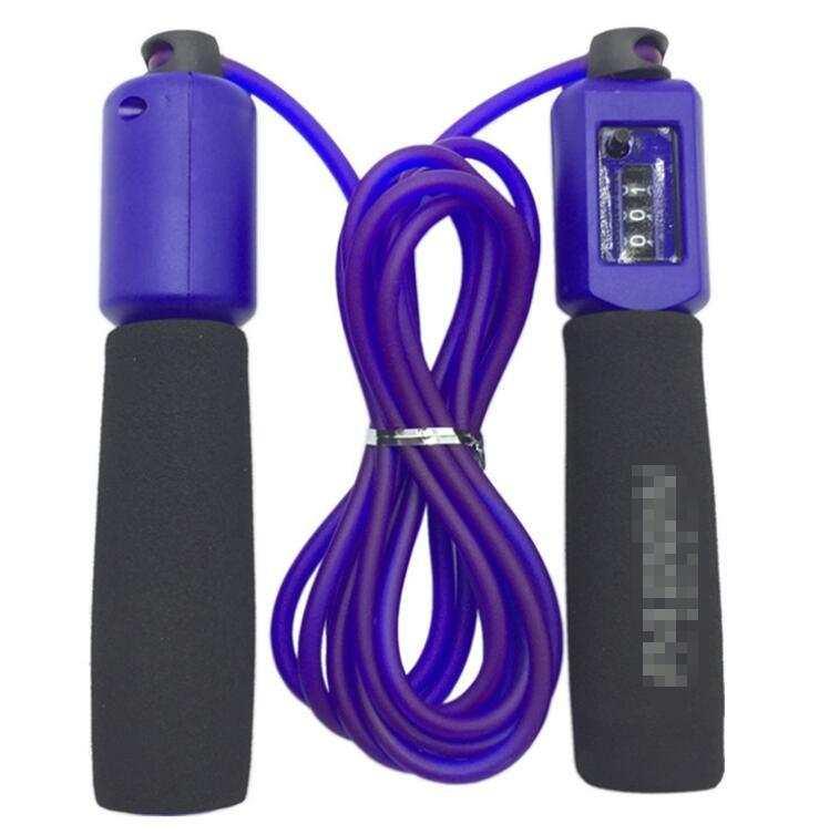 Purple jump rope with black foam handles and built-in digital counter
