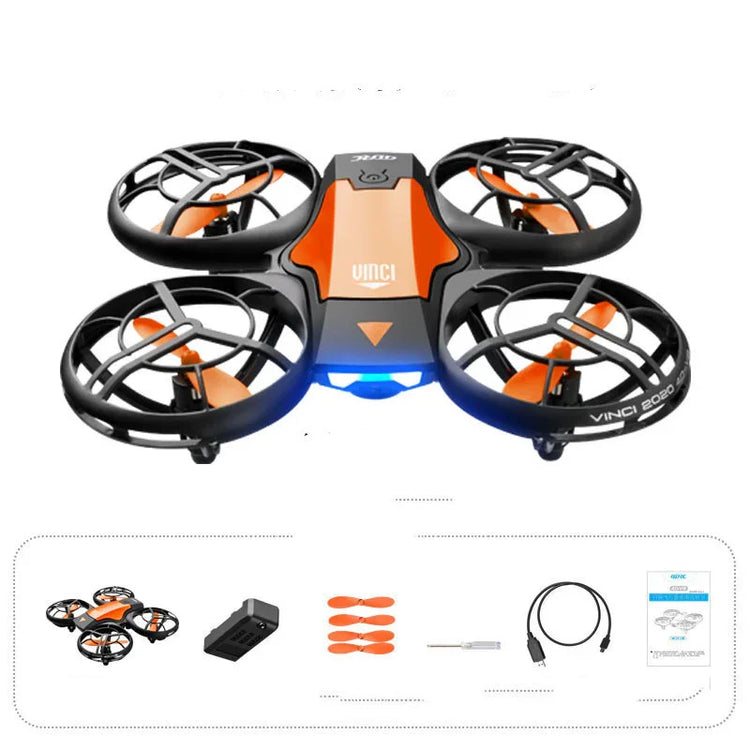 Compact quadcopter drone with orange and black body, propeller guards, and accessory kit included