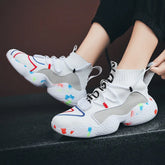 White high-top sneakers with colorful accents, mesh knit material, chunky textured sole