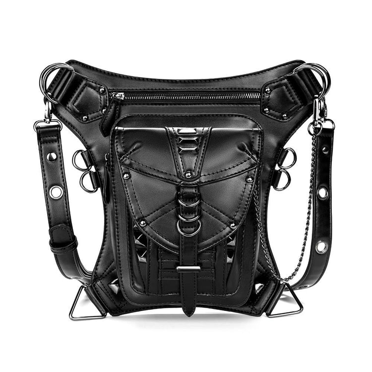 Black faux leather crossbody bag with metal hardware, adjustable strap, and edgy streetwear design