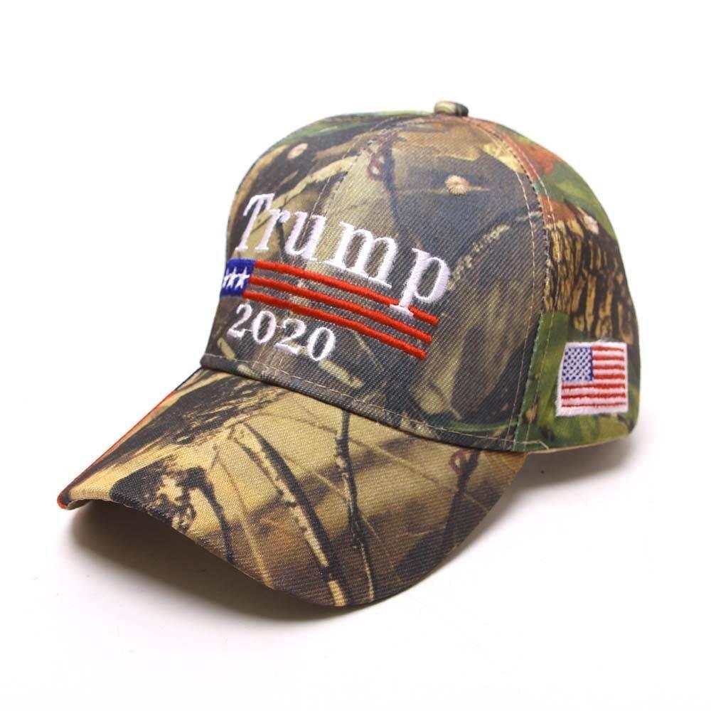 Camo print baseball cap with embroidered text, red white blue details, and American flag patch.
