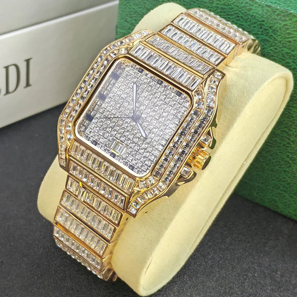 Men's gold rectangular luxury watch with full crystal accents and metal strap on cushion