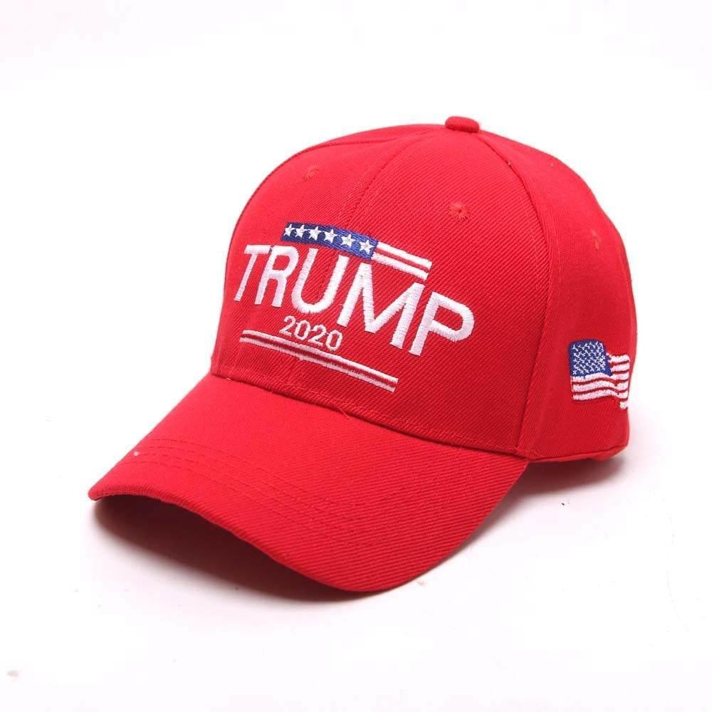 Red cotton baseball cap with curved brim, embroidered white and blue text, and flag patches