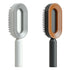 Modern oval hair brushes with grey and brown plastic bodies, ergonomic handles