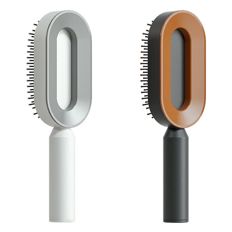 Modern oval hair brushes with grey and brown plastic bodies, ergonomic handles