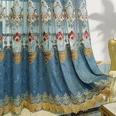 Blue and gold embroidered curtain with intricate lace details and ornate pattern