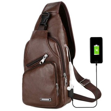 Brown faux leather crossbody sling bag with USB charging port and zippered pockets
