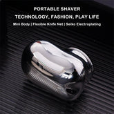 Sleek silver portable shaver with curved metallic body, compact and modern design
