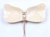 Beige strapless adhesive bra with lace-up front, breathable perforated cups, and adjustable back ties