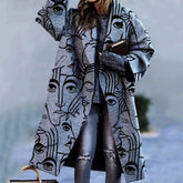 Oversized gray streetwear coat with abstract face print, relaxed fit, paired with ripped jeans