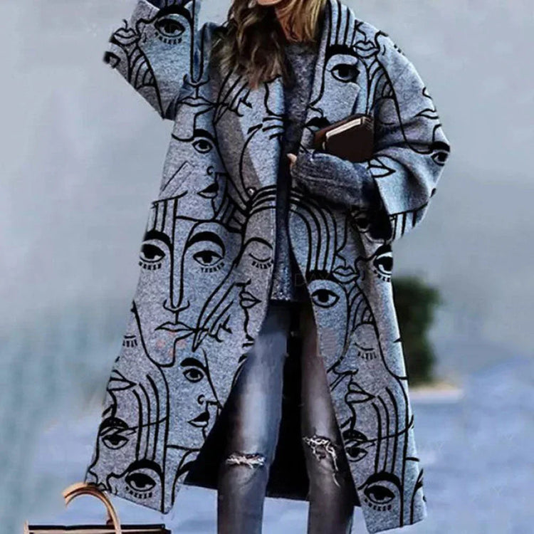 Oversized gray streetwear coat with abstract face print, relaxed fit, paired with ripped jeans