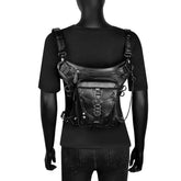 Mannequin wearing black short sleeve shirt with harness style leather chest bag