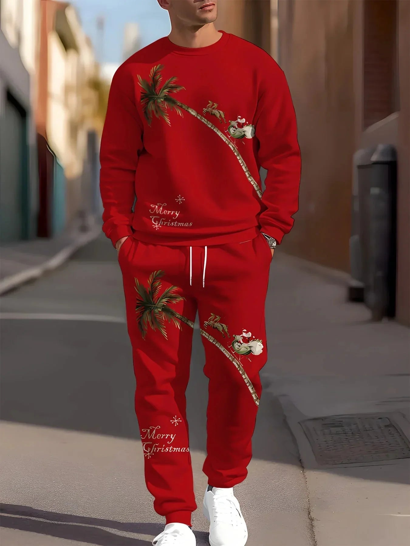 Man wearing red Christmas-themed streetwear set with palm tree and Santa print, relaxed fit.