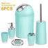 Six-piece aqua blue bathroom accessories set with silver accents, includes trash bin, toilet brush, soap dispenser, tumbler, toothbrush holder, and soap dish.