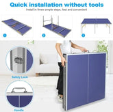 Foldable blue portable table with safety lock and handle, easy tool-free setup shown indoors.