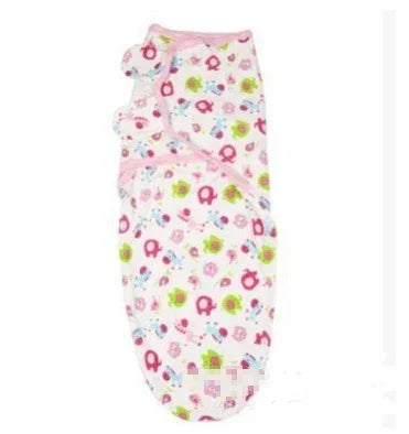Soft cotton baby swaddle in pastel pink with colorful animal print and adjustable fit