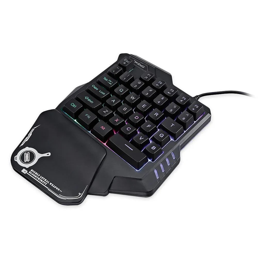 Black one-handed gaming keypad with RGB backlit keys and ergonomic wrist rest.