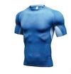 Blue textured athletic compression shirt with short sleeves and snug fit