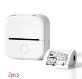 Compact white mini thermal printer with sample roll displaying bus illustration, tech gadget