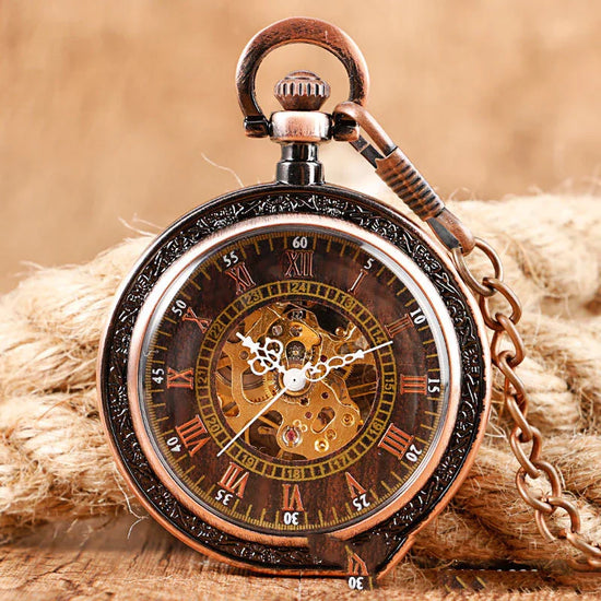 Vintage bronze pocket watch with Roman numerals, skeleton dial, and decorative chain