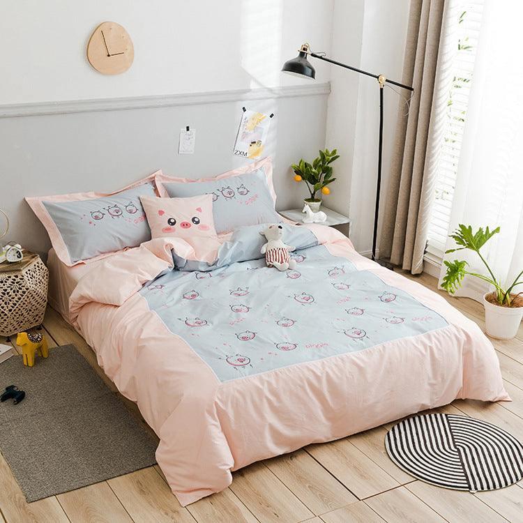 Light pink and blue bedding set with cute pig cartoon print, soft cotton material, cozy fit