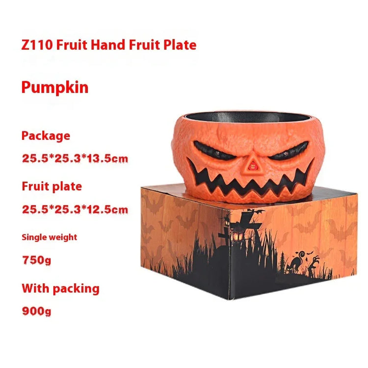 Orange pumpkin-shaped fruit bowl with carved face, textured plastic, Halloween decor