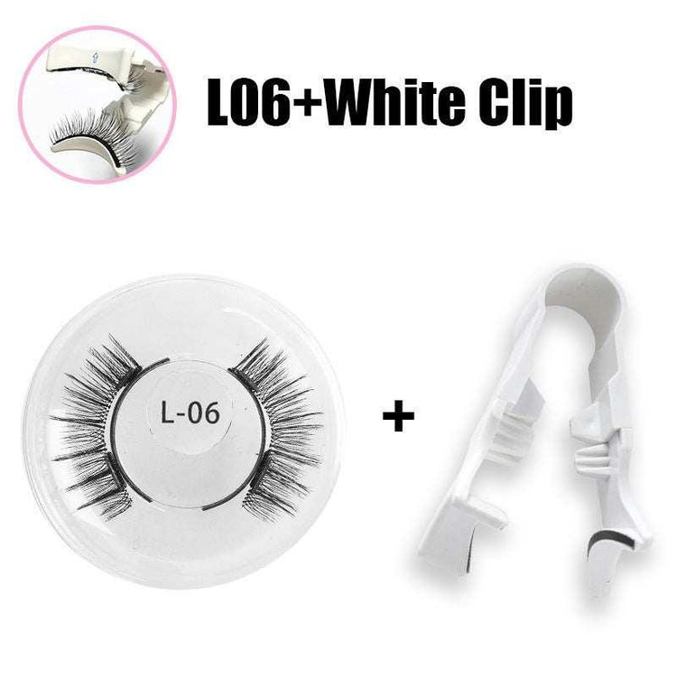 Black false eyelashes in round case with white plastic eyelash applicator clip