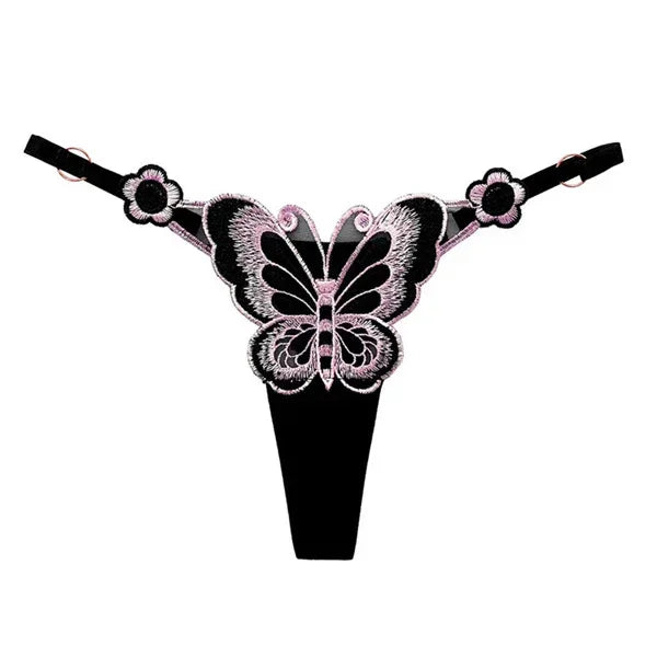 Black butterfly lace thong with pink embroidery, floral details, and adjustable straps.