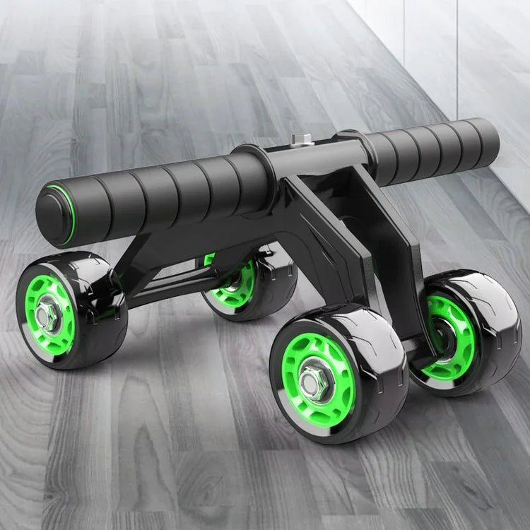 Black and neon green ab roller with four wheels and padded handles on a wood floor