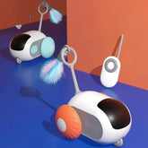 Futuristic remote control cat toys with colorful wheels and fluffy tails on blue surface