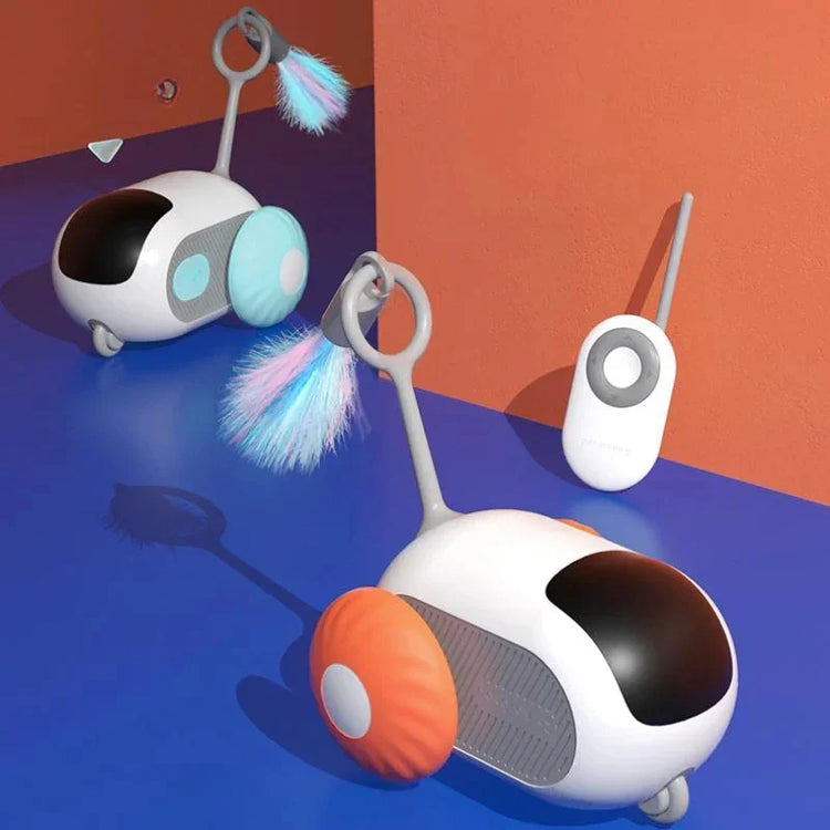 Futuristic remote control cat toys with colorful wheels and fluffy tails on blue surface