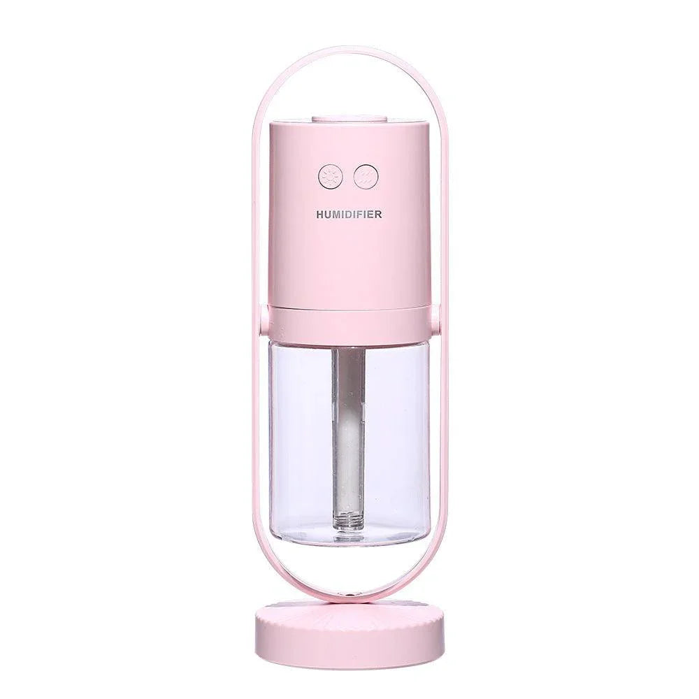 Minimalist pink portable humidifier with clear water tank and two control buttons