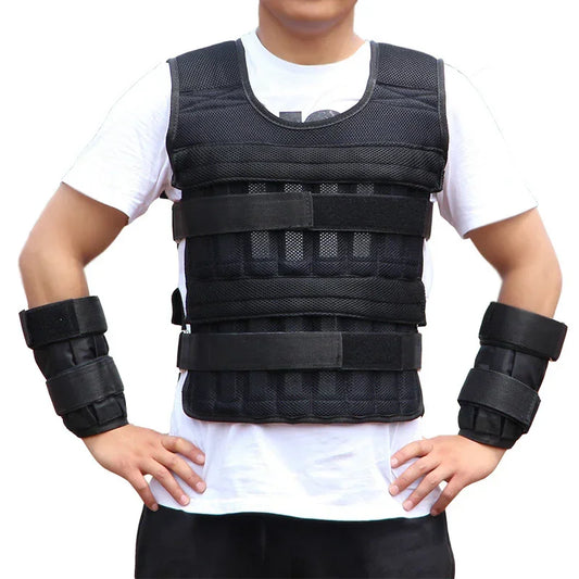 Man wearing black padded weighted vest and matching wrist weights over a white t-shirt