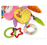 Plush pink and yellow bunny toy with textured plastic rings and colorful teether
