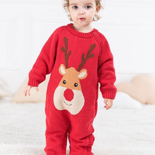 Toddler wearing red knit romper with reindeer pattern, long sleeves, cozy fit, festive style