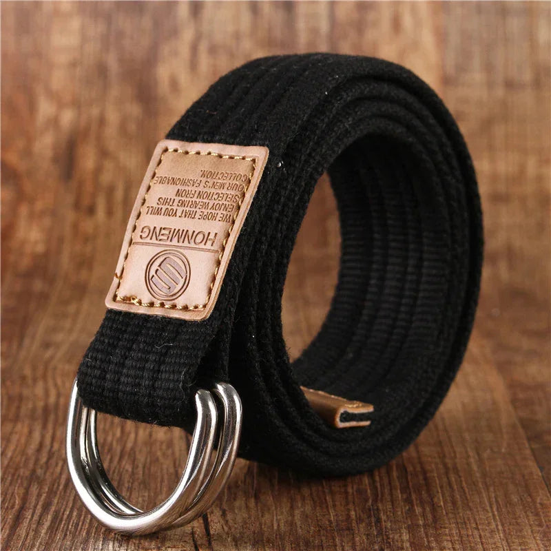 Black canvas belt with double metal D-ring buckle and brown leather tag, casual style